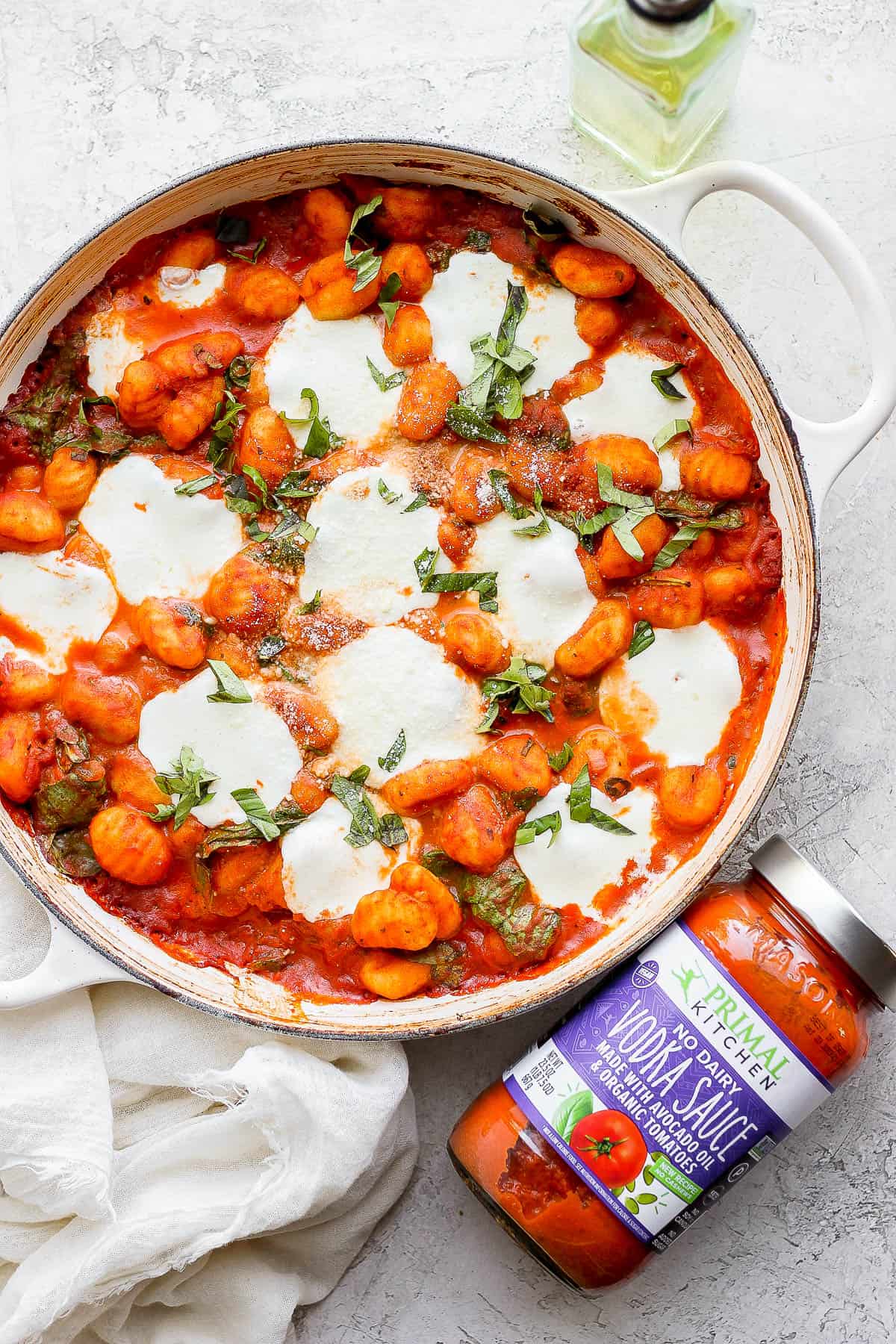 Baked gnocchi with a jar of vodka sauce on the side.