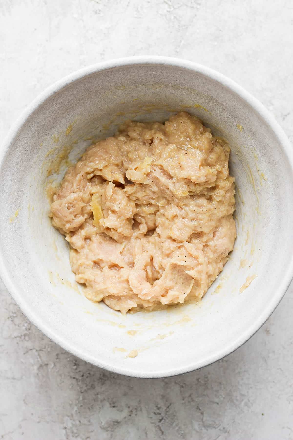 Ginger chicken meatball mixture in a bowl.