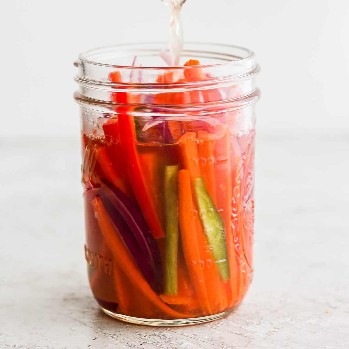 Jar of quick pickled vegetables.