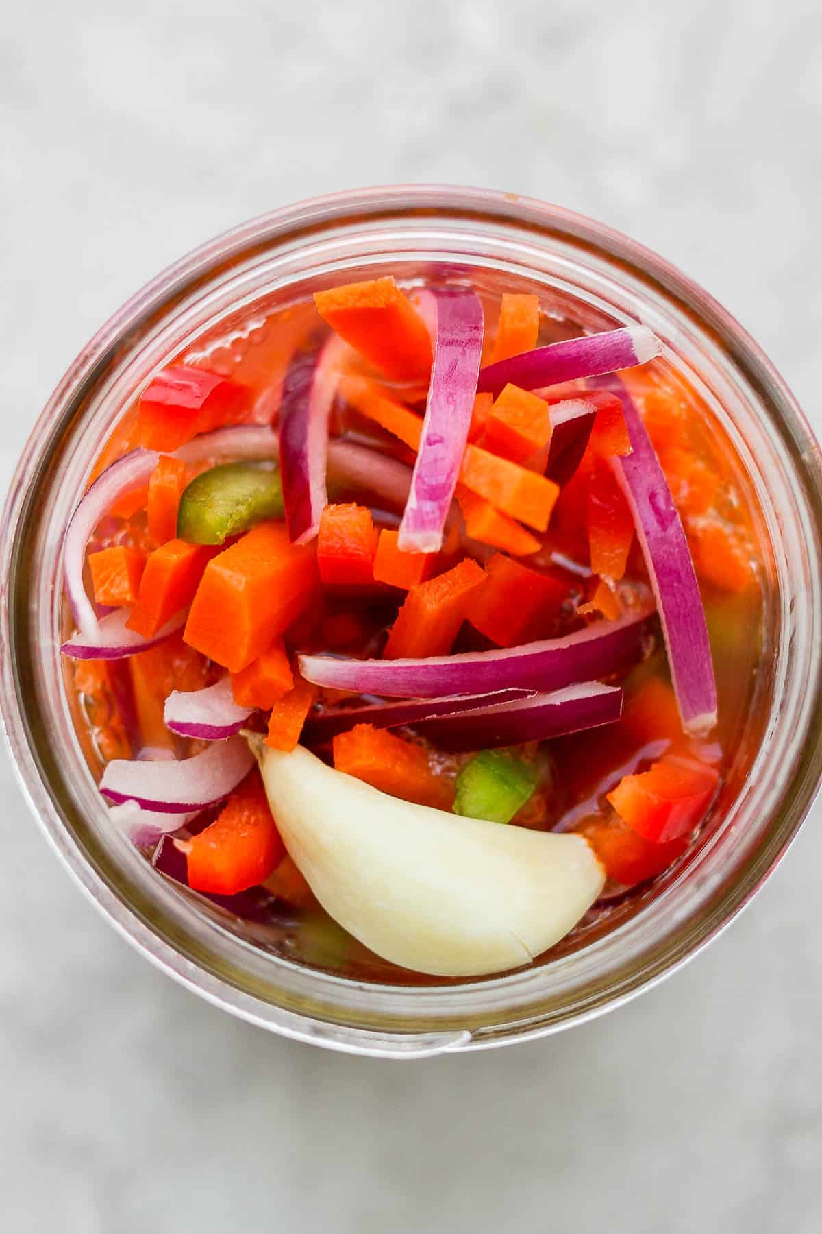 A jar of quick pickled vegetables.