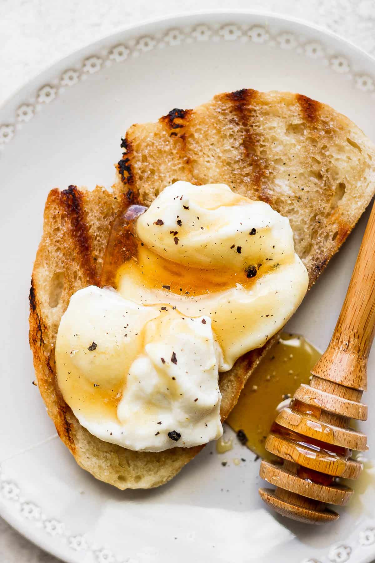 Whipped ricotta on grilled bread with added honey.