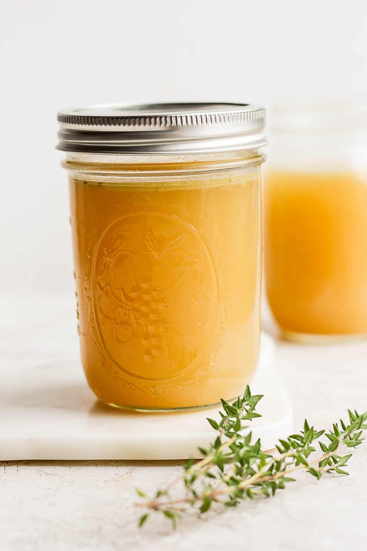 Homemade turkey broth in a mason jar.