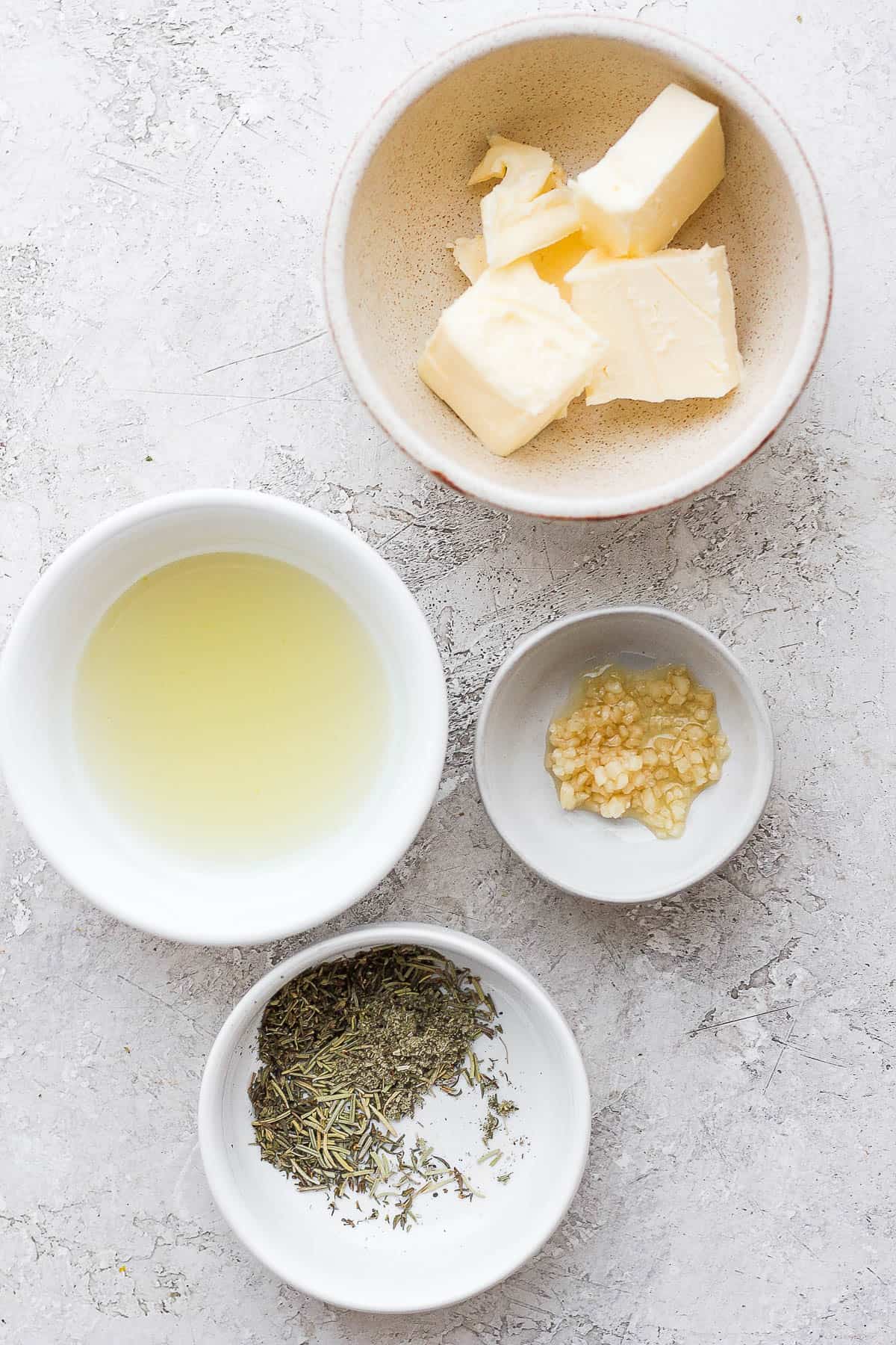 Turkey baste ingredients in small bowls.