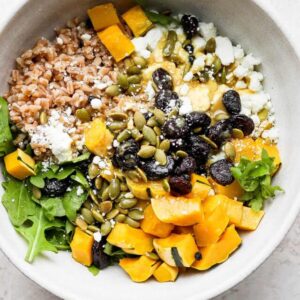 Farro salad with toppings in a bowl.