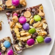 A monster cookie magic bar on a plate.