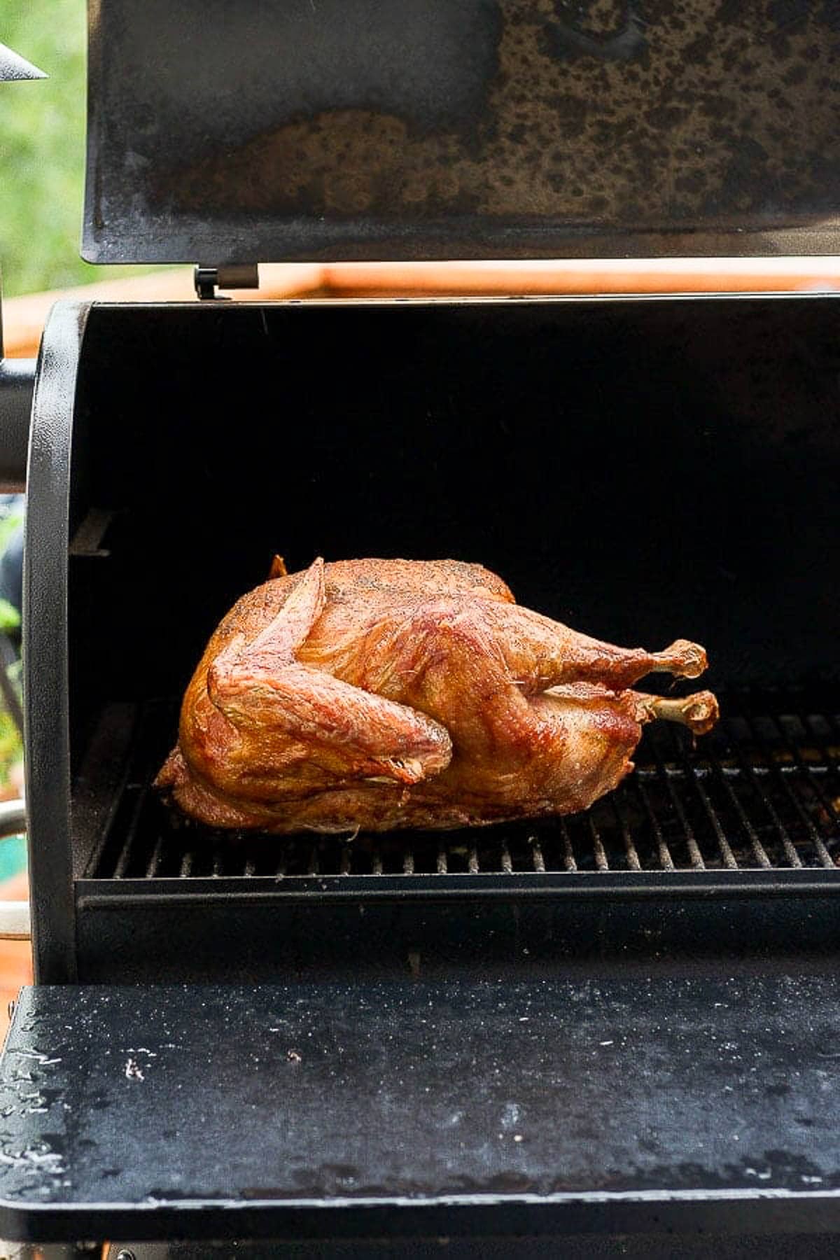 A smoked turkey on a Traeger grill.