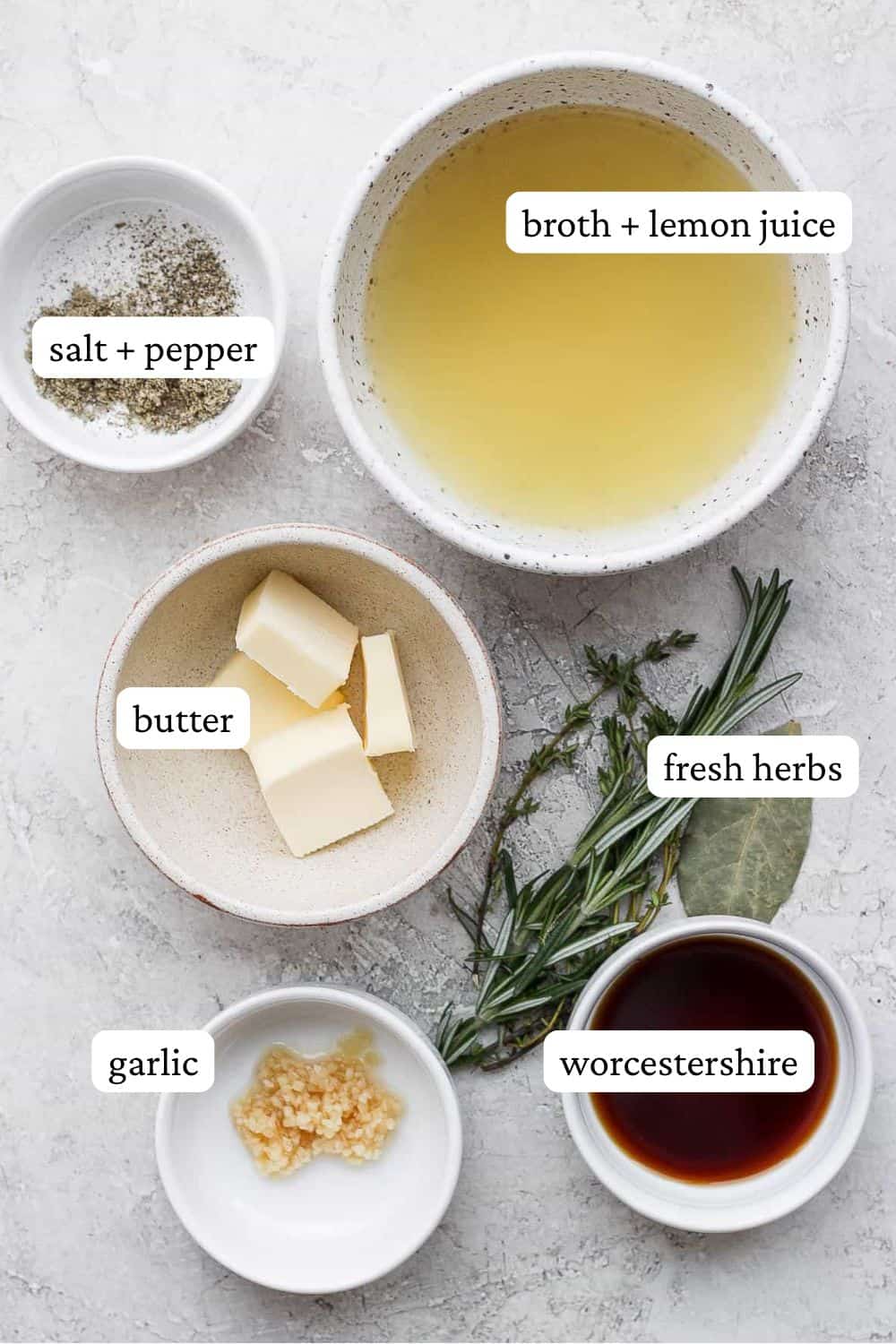 Ingredients for a turkey injection recipe separated out into bowls. 