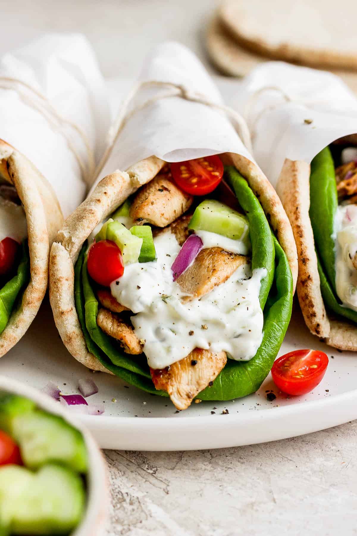 A gyro with tzatziki sauce.