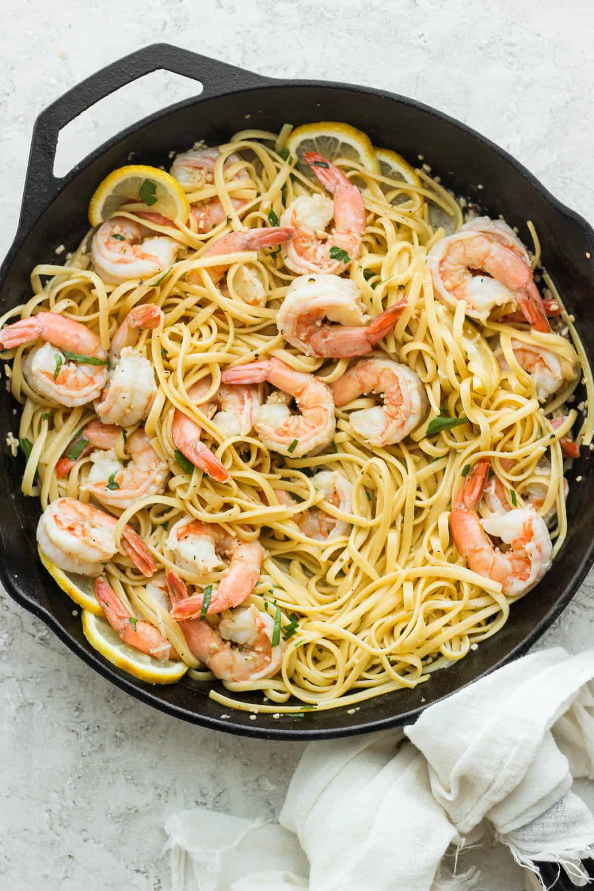 Cooked noodles added to the pan and tossed with the shrimp and sauce.
