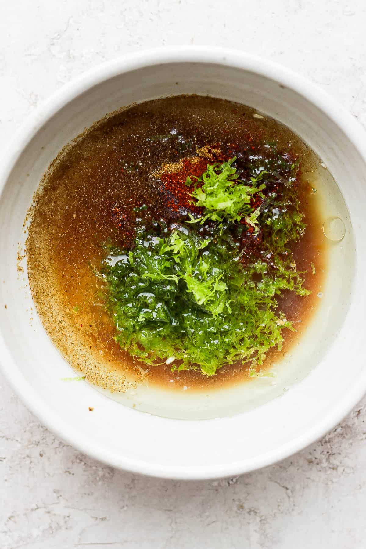 Marinade ingredients in a small bowl.