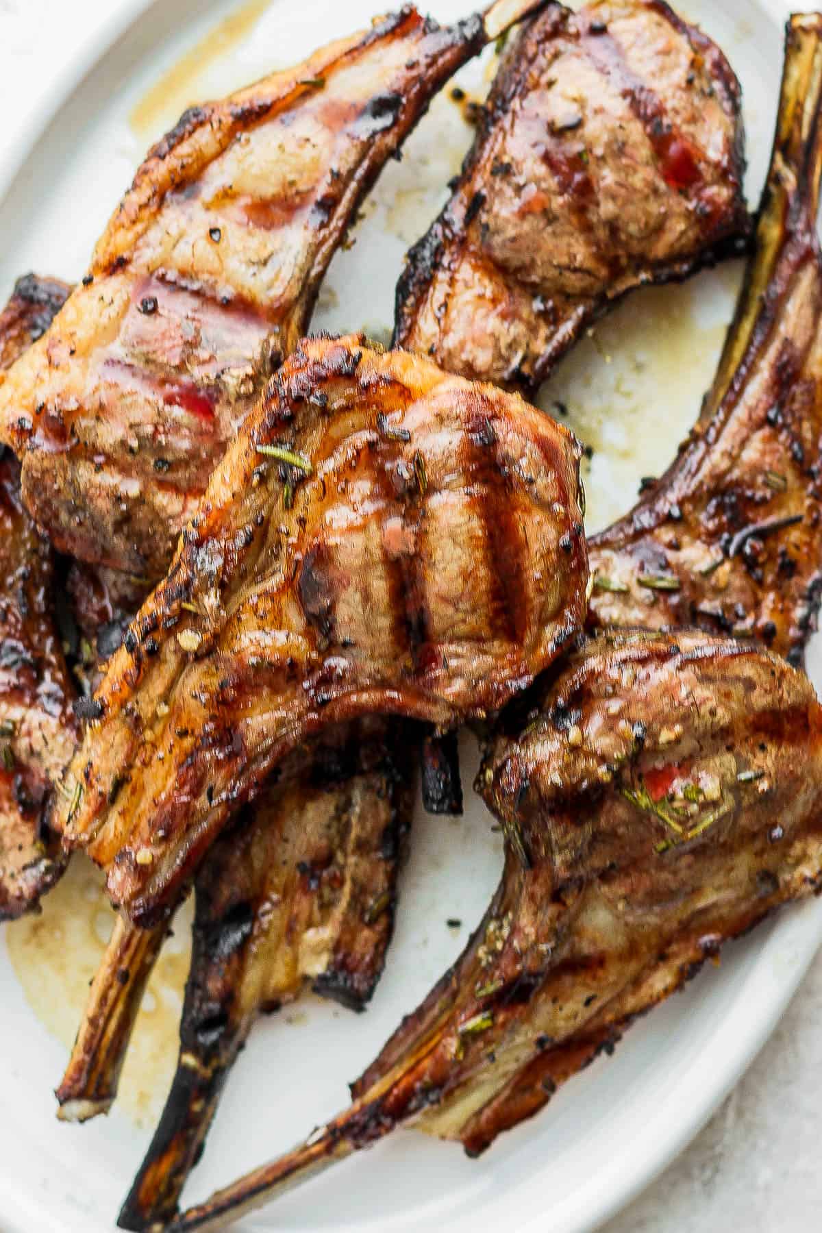 Grilled lamb chops on a plate.