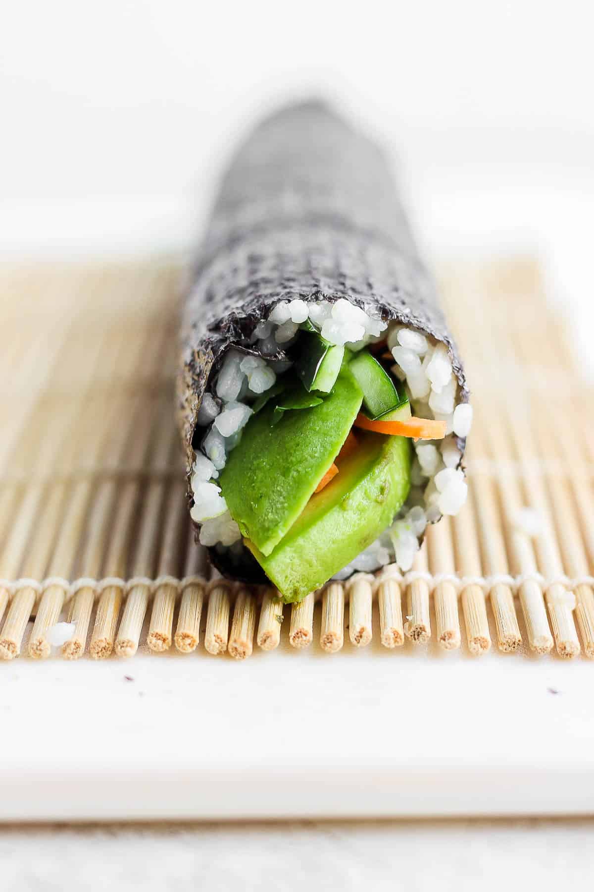 A fully rolled avocado roll.