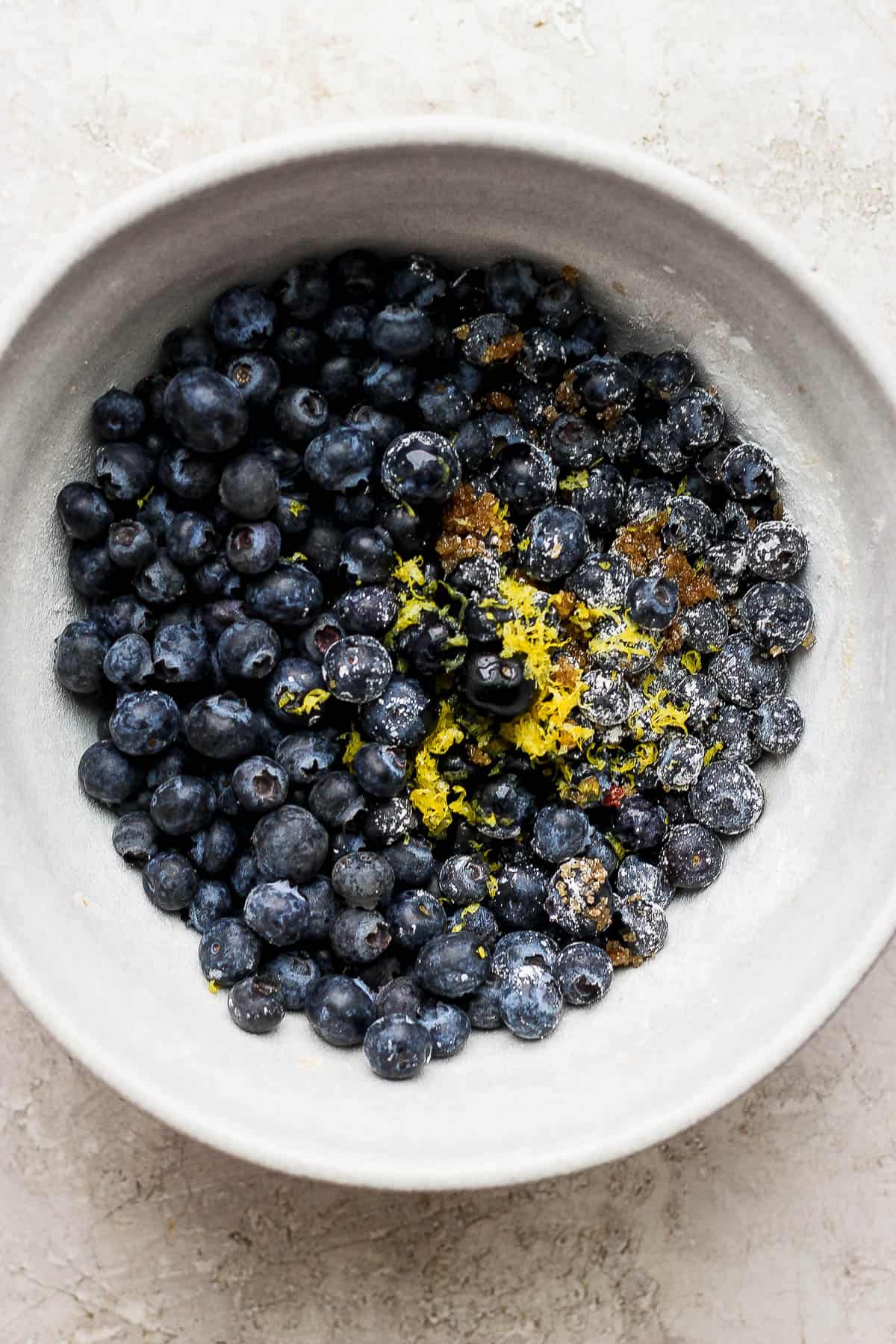 The blueberry mixture in a mixing bowl.