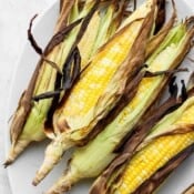 The best grilled corn on the cob in husk.
