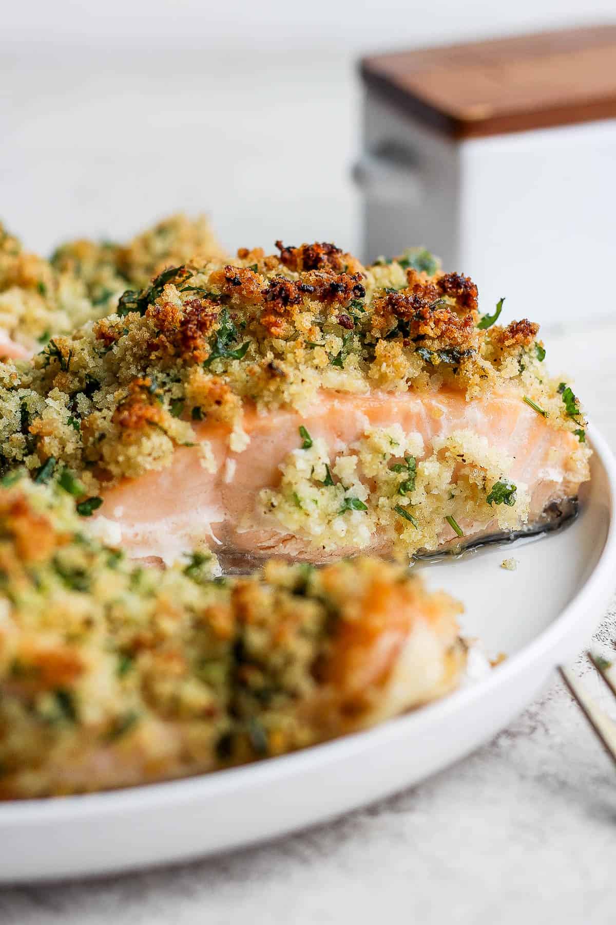Panko crusted salmon on a plate. 