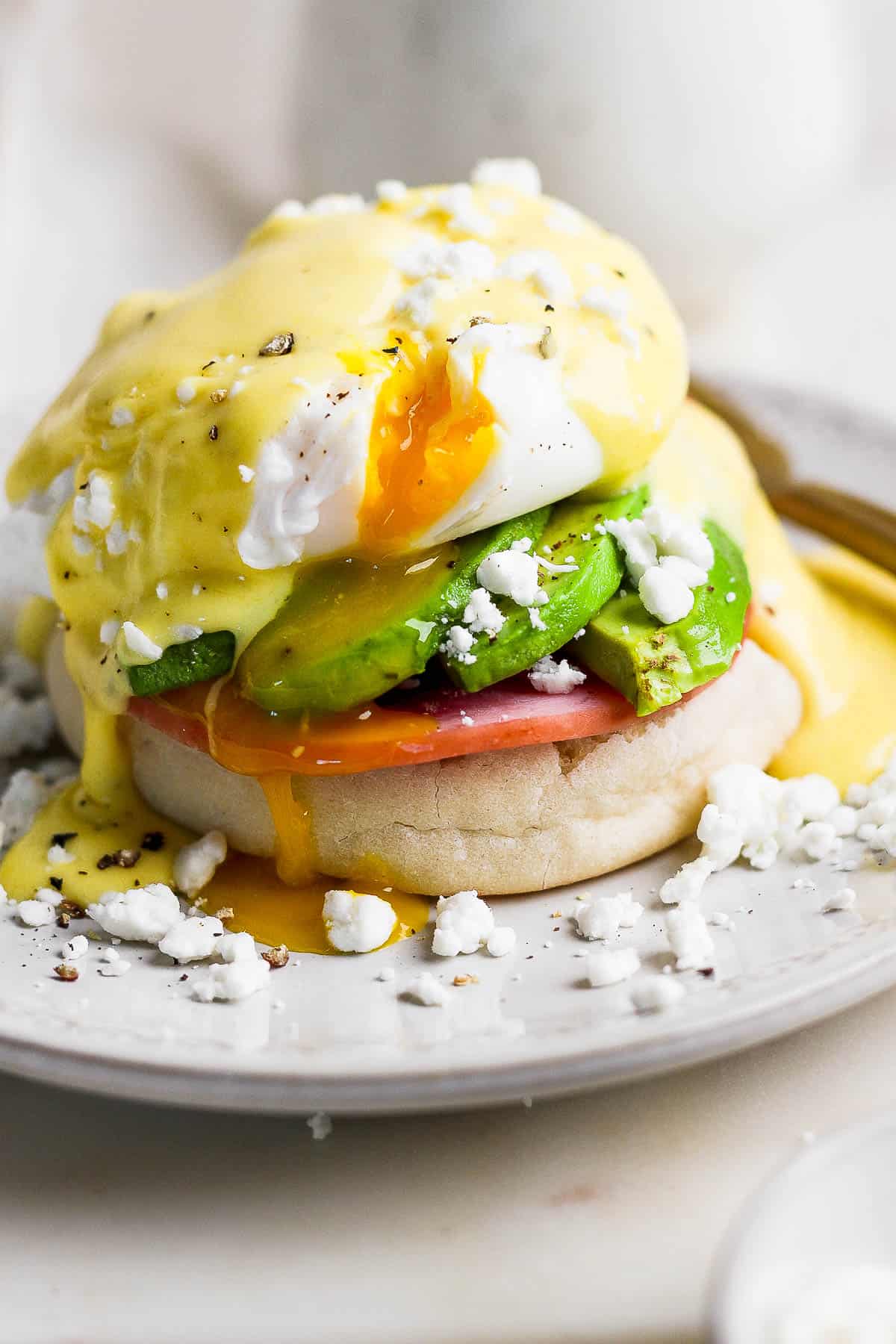 An alternative eggs Benedict made with avocado and goat cheese on top.