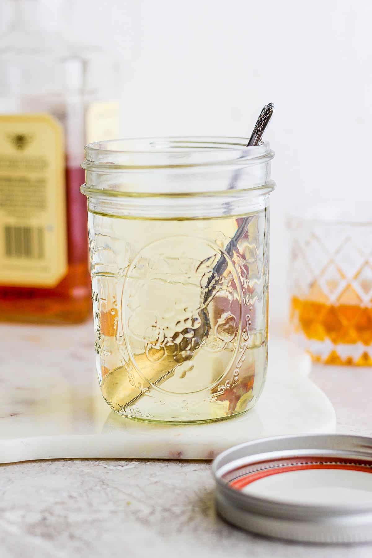 A mason jar of simple syrup.