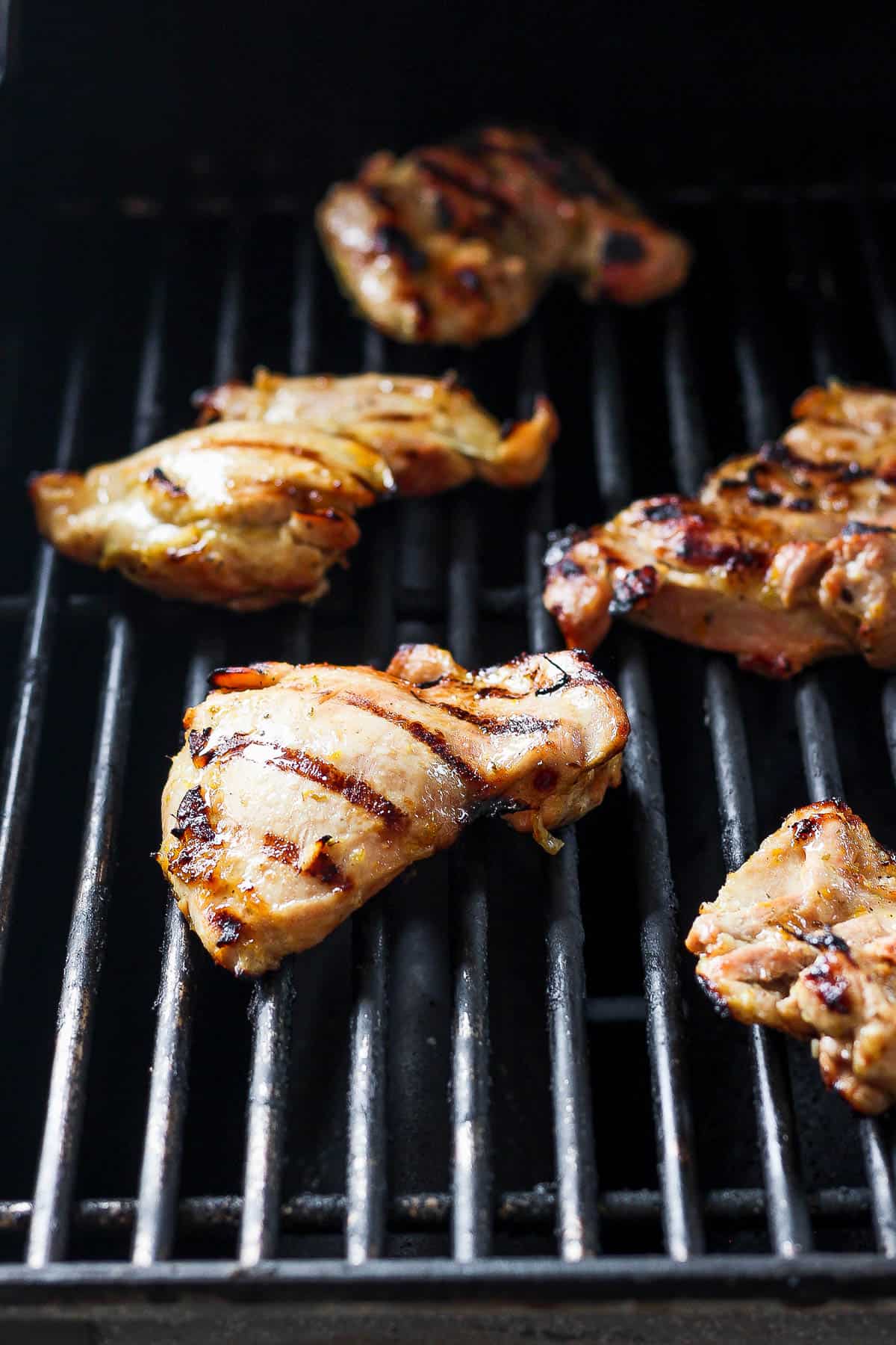 Mojo chicken thighs on the grill.