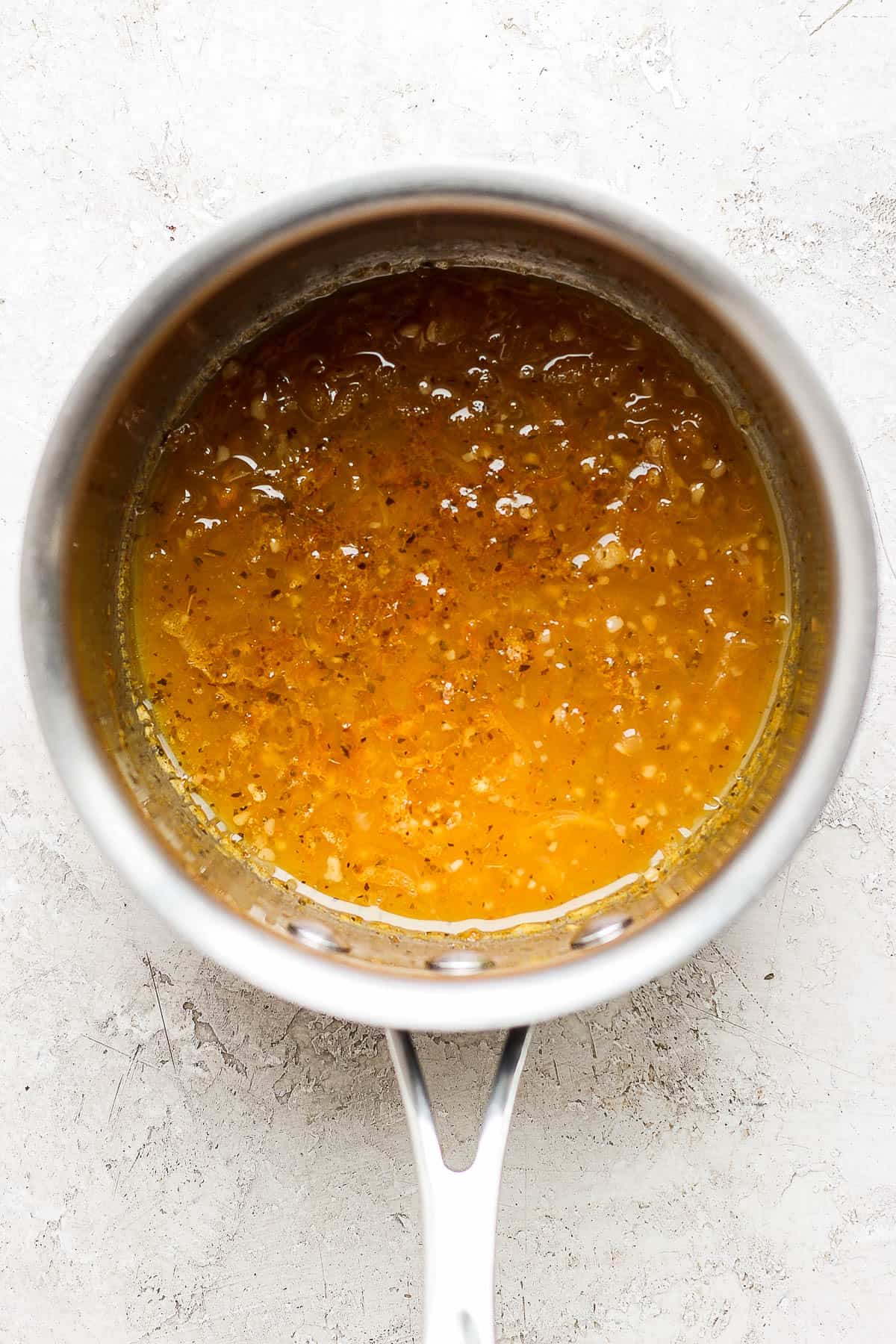 The mojo mariande in a small saucepan.