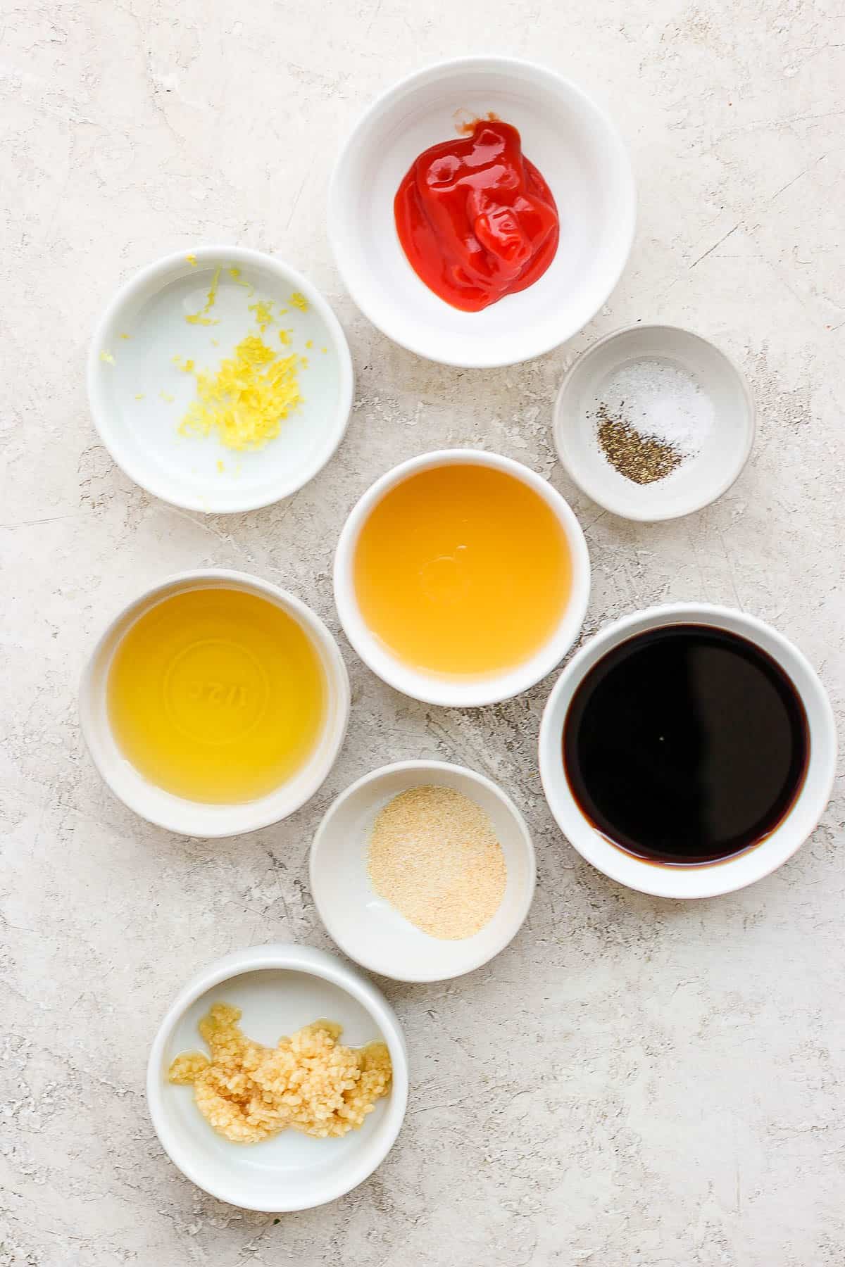 Rib marinade ingredients in separate bowls.