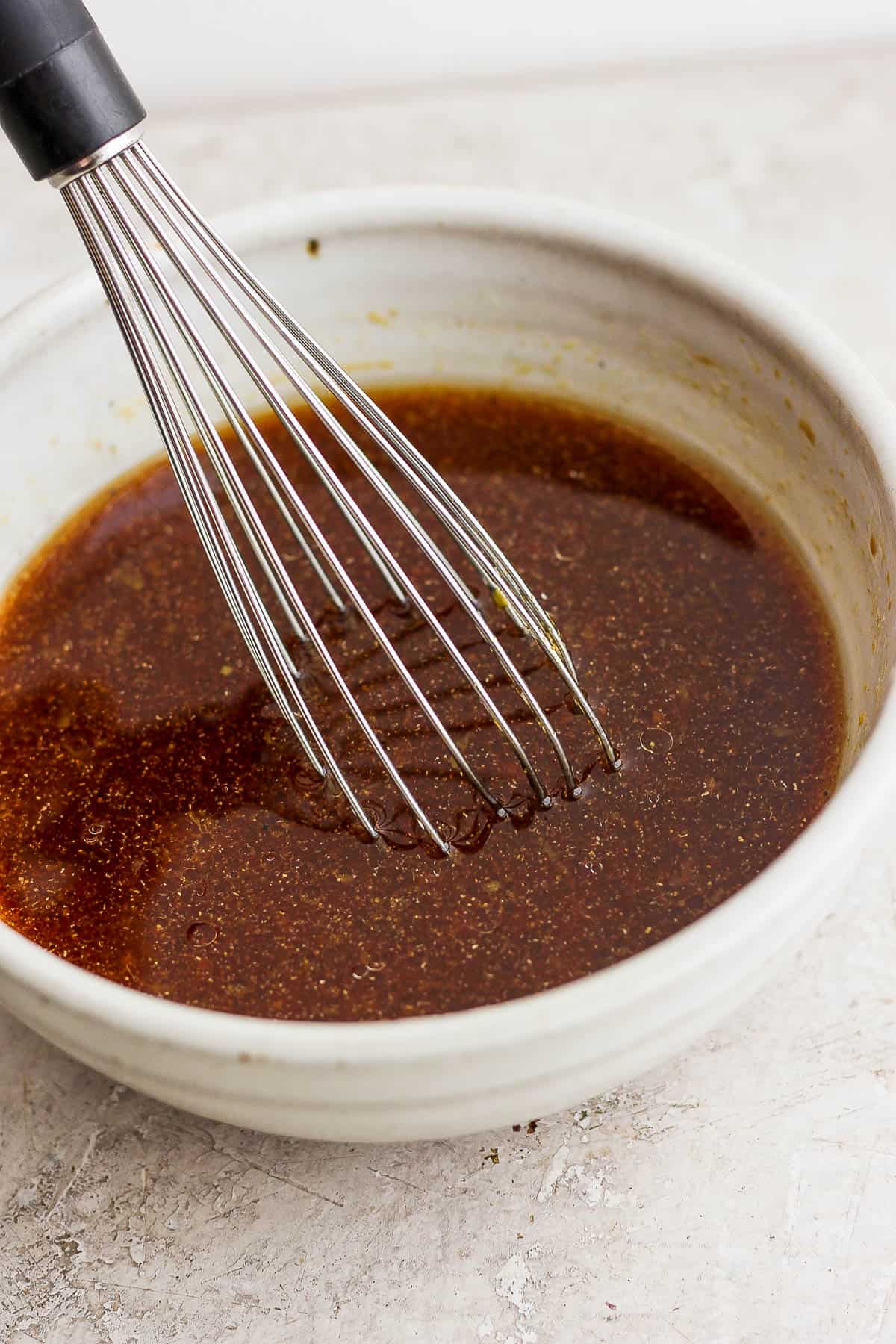 The rib marinade whisked together in a small bowl.