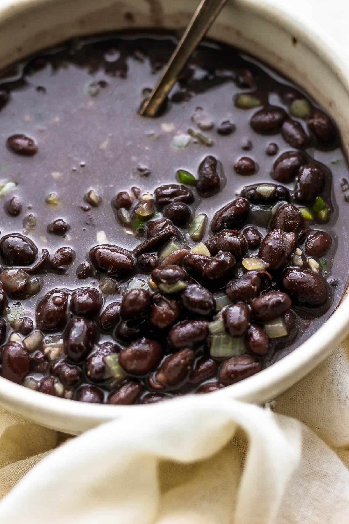 A bowl of seasoned black beans.