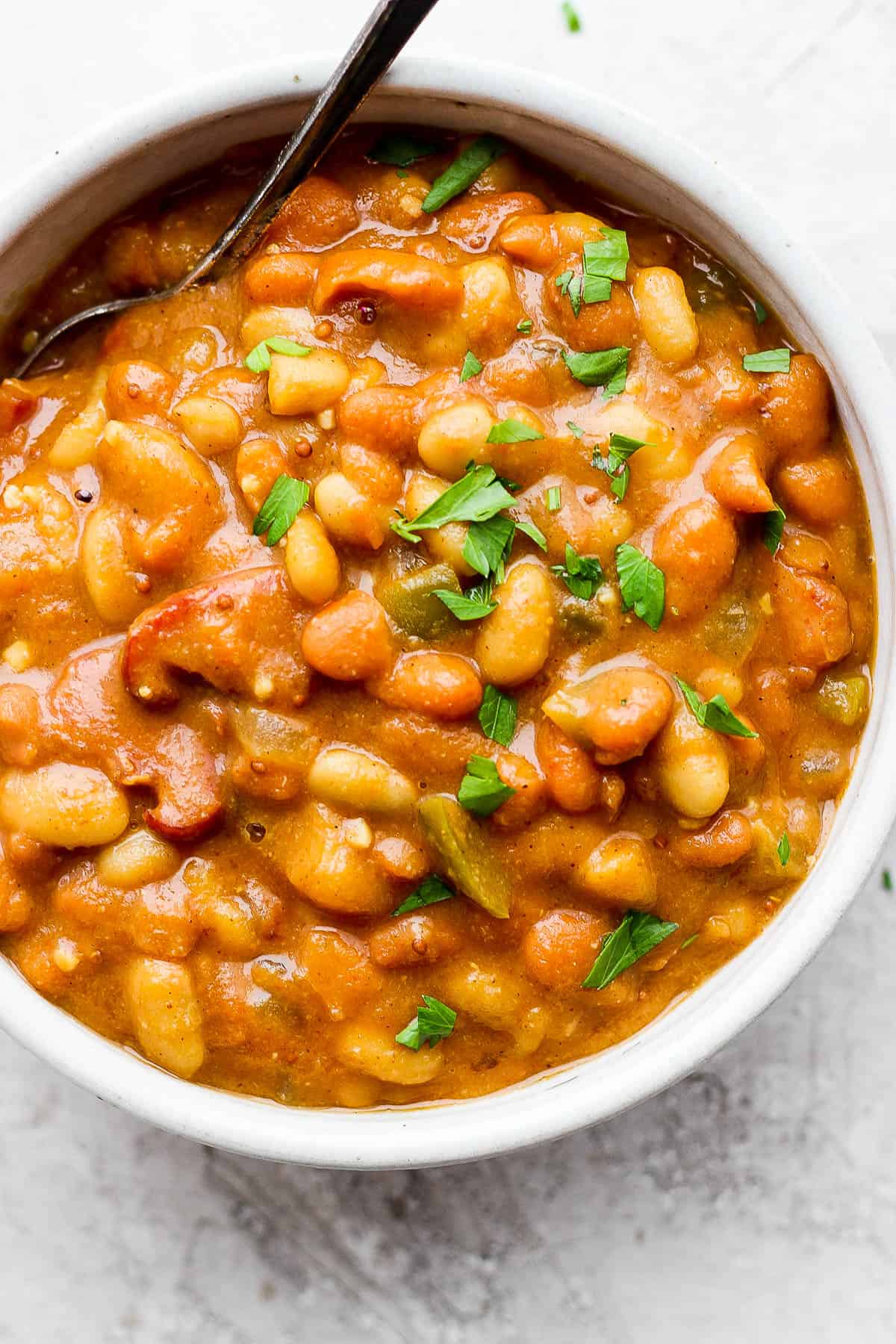 Slow Cooker Baked Beans Recipe (Tangy and Creamy)