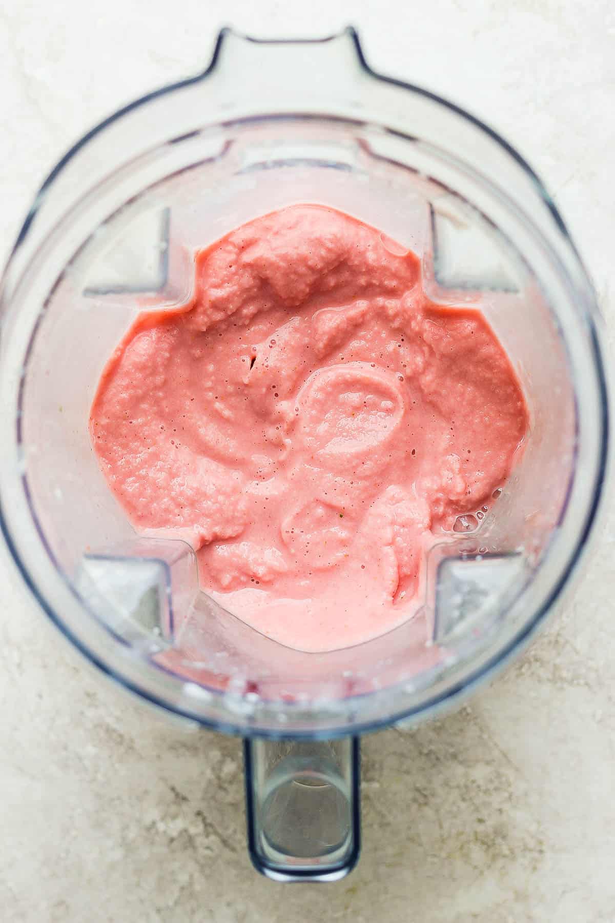 A fully blended watermelon smoothie in the blender.