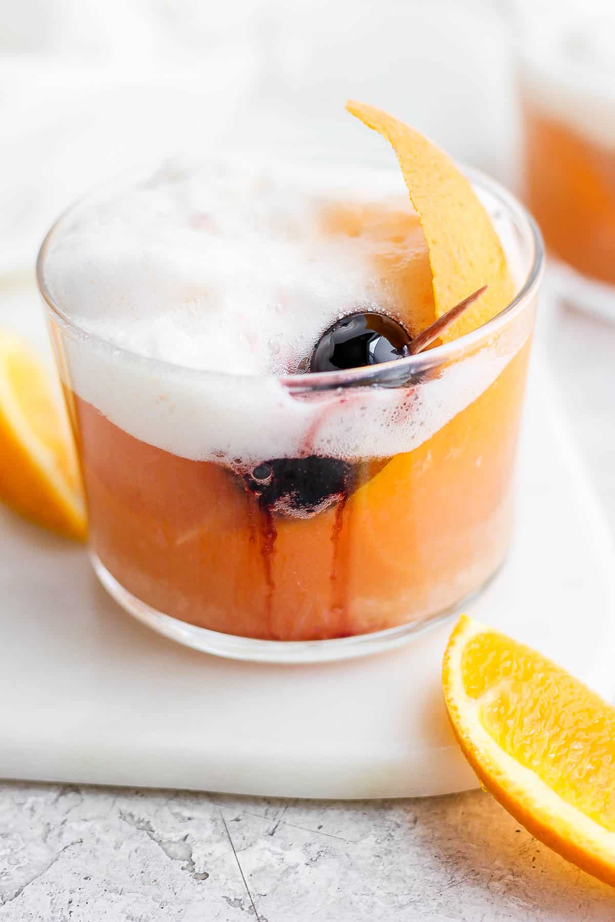 The best cranberry orange whiskey sour cocktail recipe.