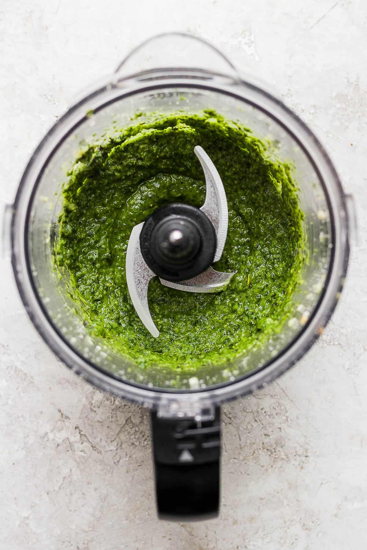 A fully blended pesto in the food processor.