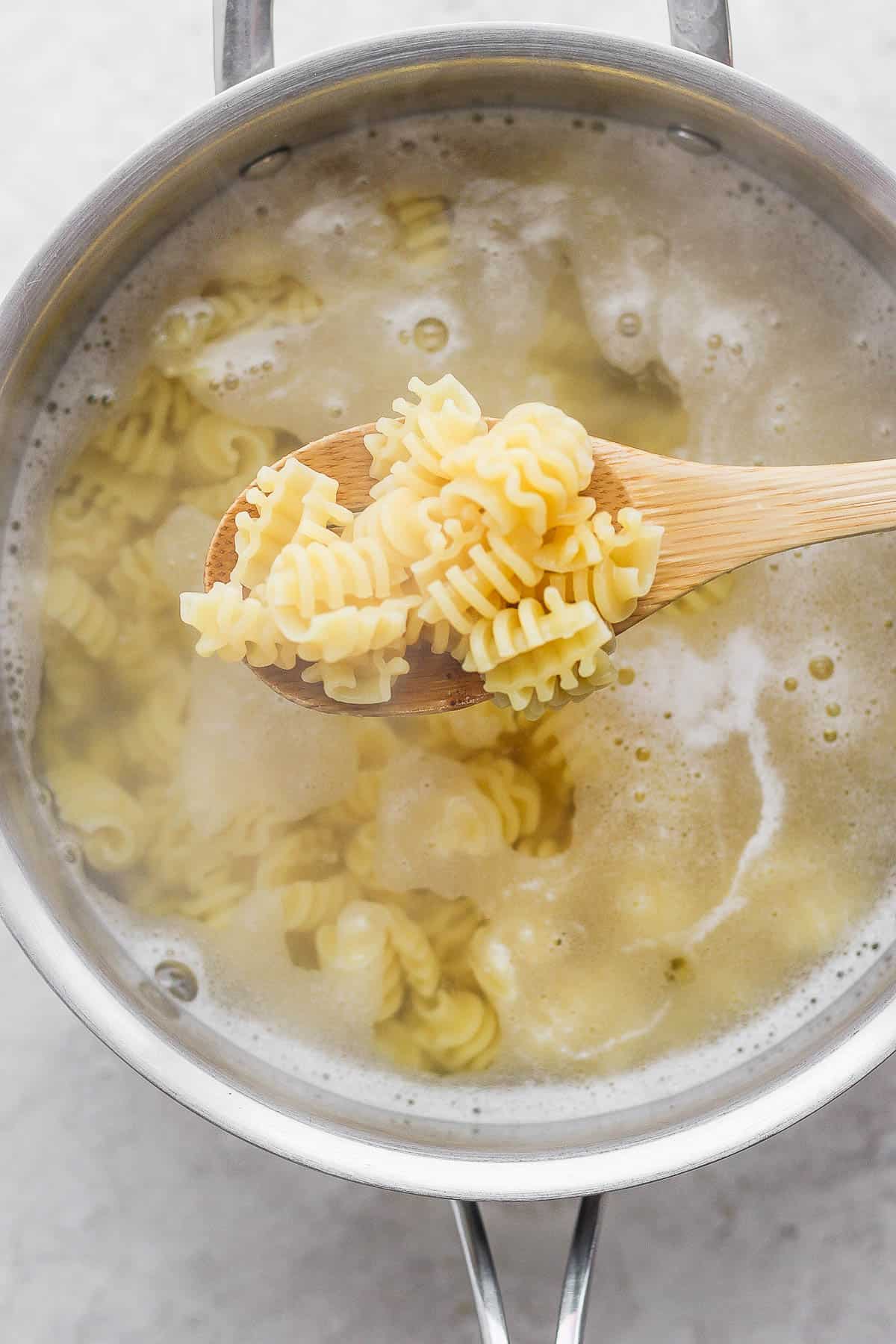 Radiatori pasta cooked al dente in a medium sized pot.