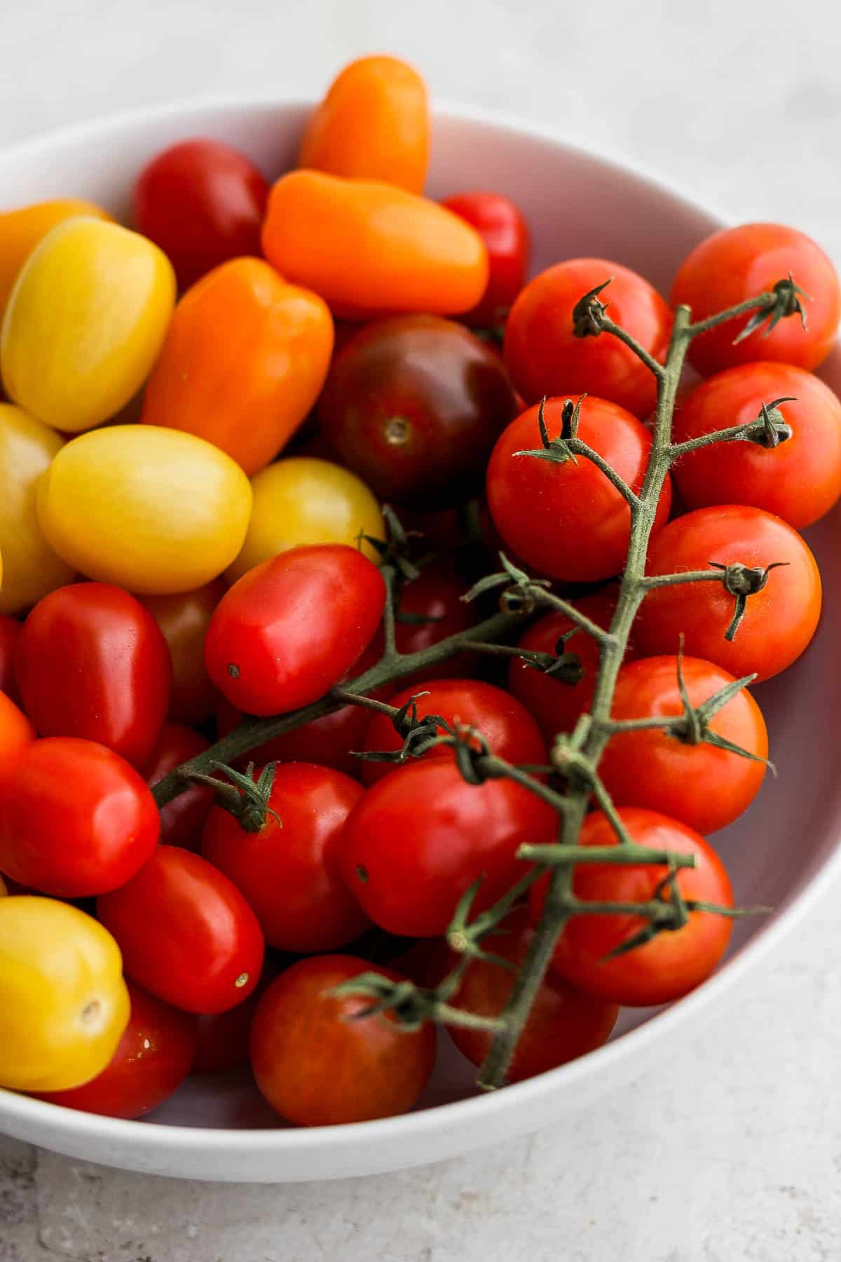 A bowl of cherry tomatoes.