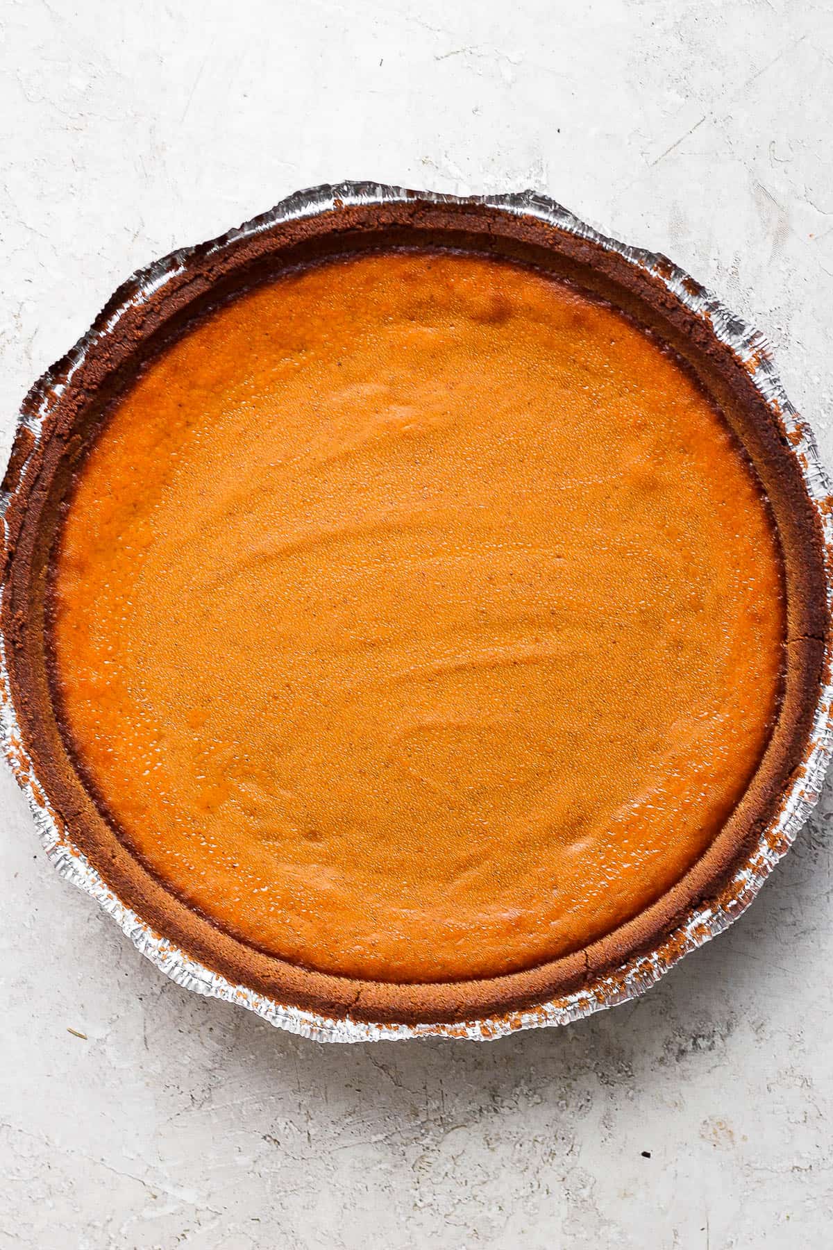 A fully baked pumpkin pie.