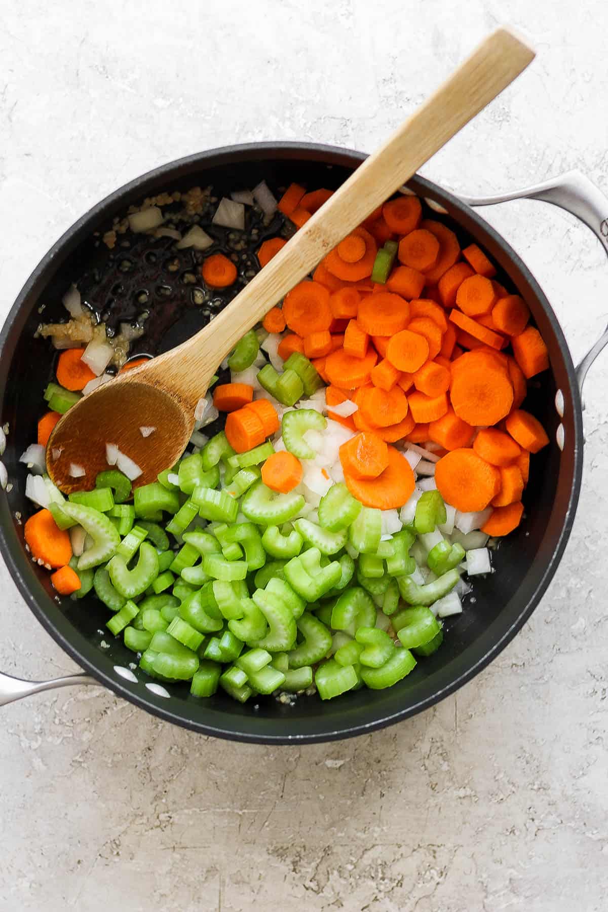 Carrots, celery, and onion added to the pot.