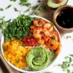 An easy recipe for a spicy shrimp sushi bowl.