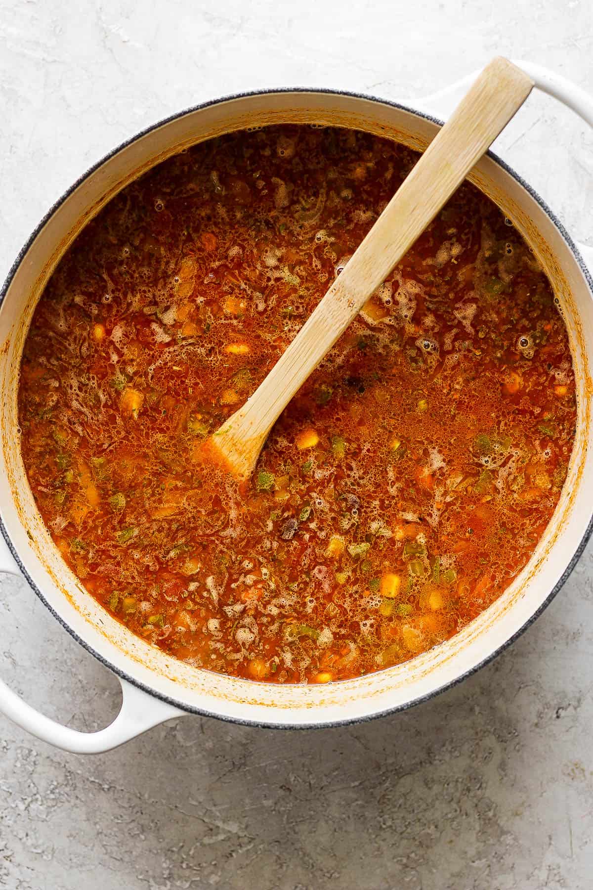 Broth added to the pot.