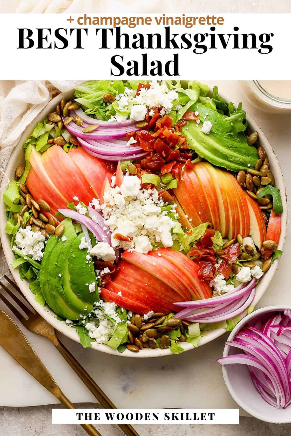 Pinterest image showing the thanksgiving salad with the title "Best thanksgiving salad + champagne vinaigrette.