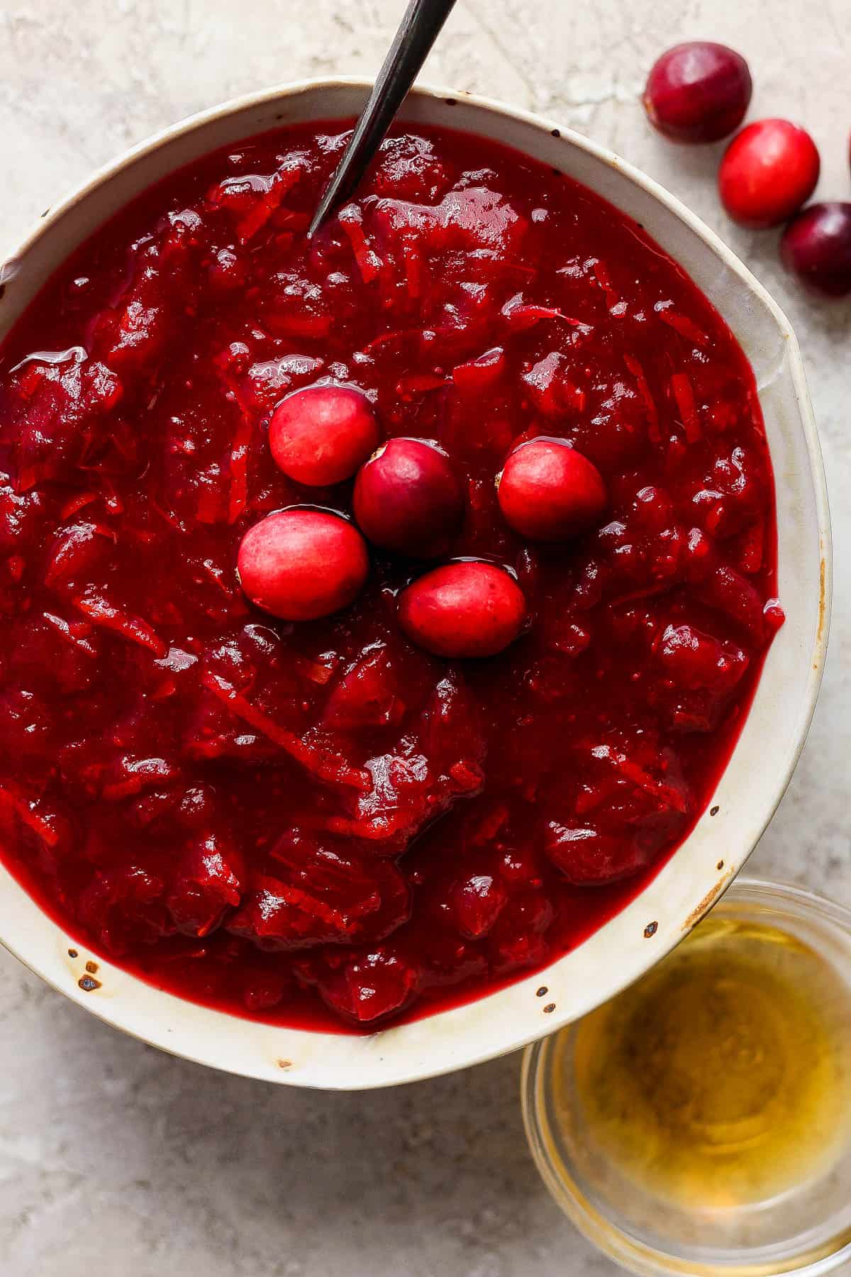 Bourbon cranberry sauce in a serving bowl on a table.