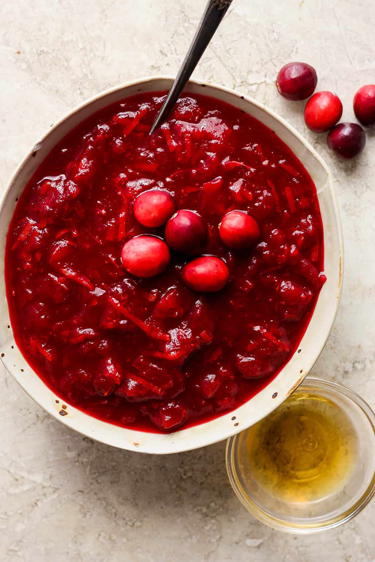 Bourbon cranberry sauce in a serving bowl on a table.