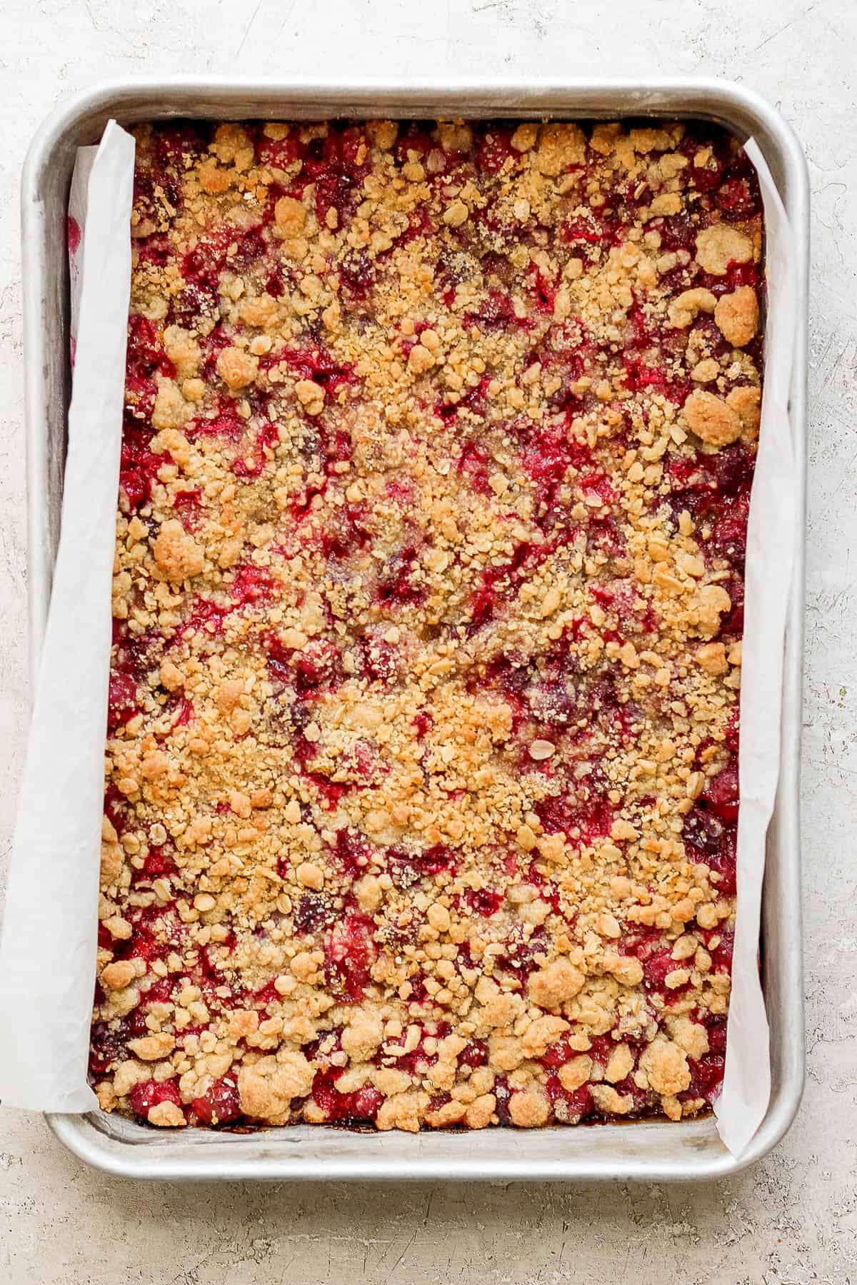 A pan of cooked cranberry bars.