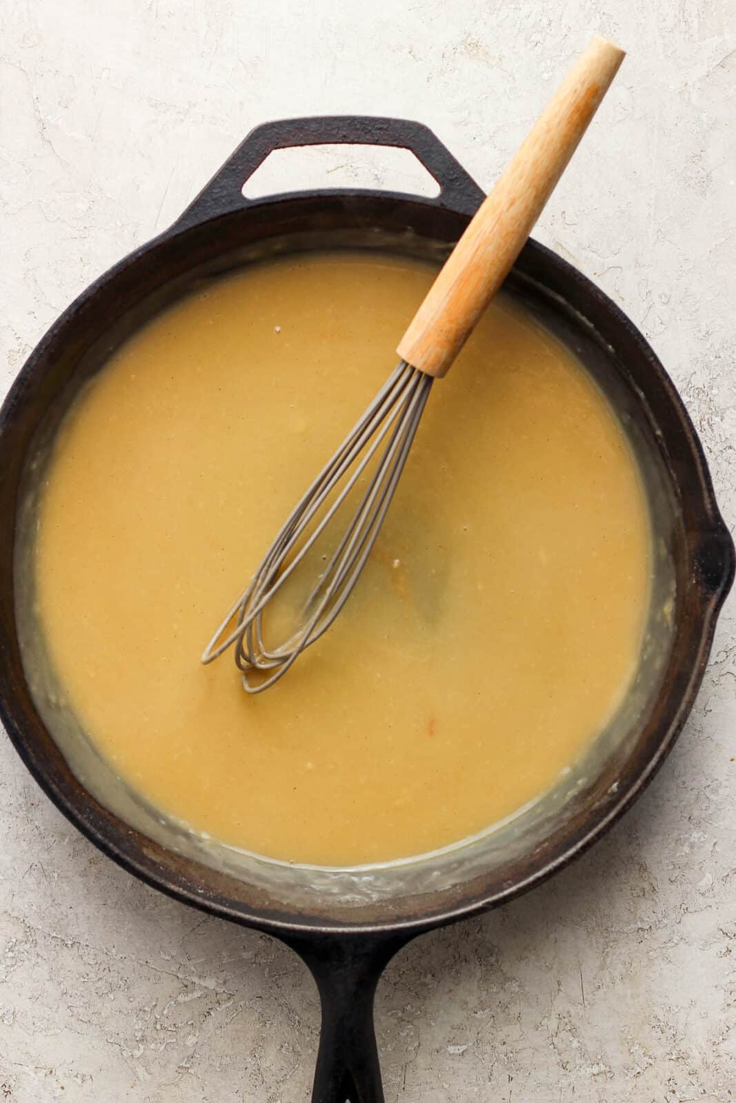 Ham gravy in a large skillet with the whisk.