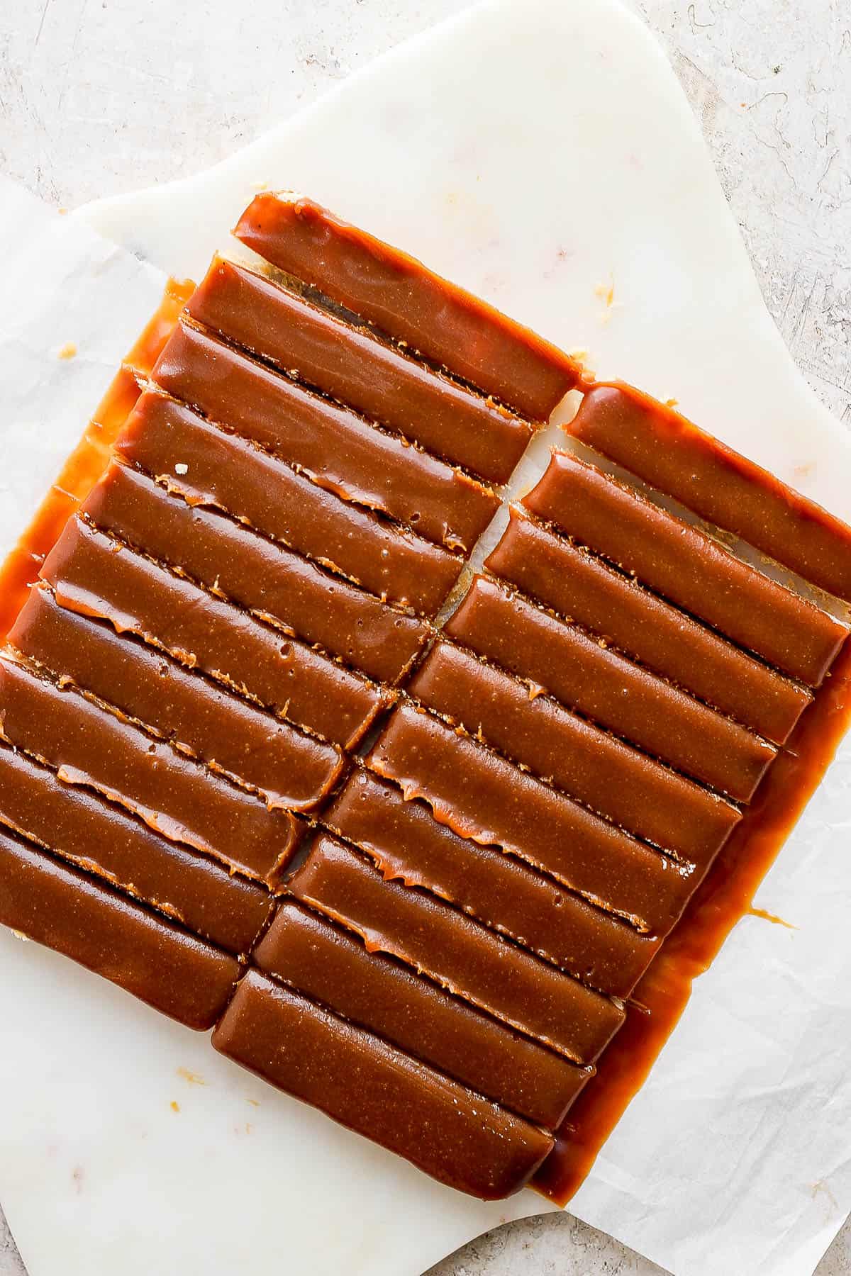 The caramel-covered shortbread cut into 12 bars.