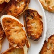 Top down shot of a plate of crostini.