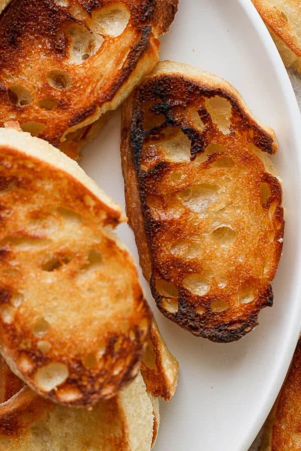 Top down shot of a plate of crostini.