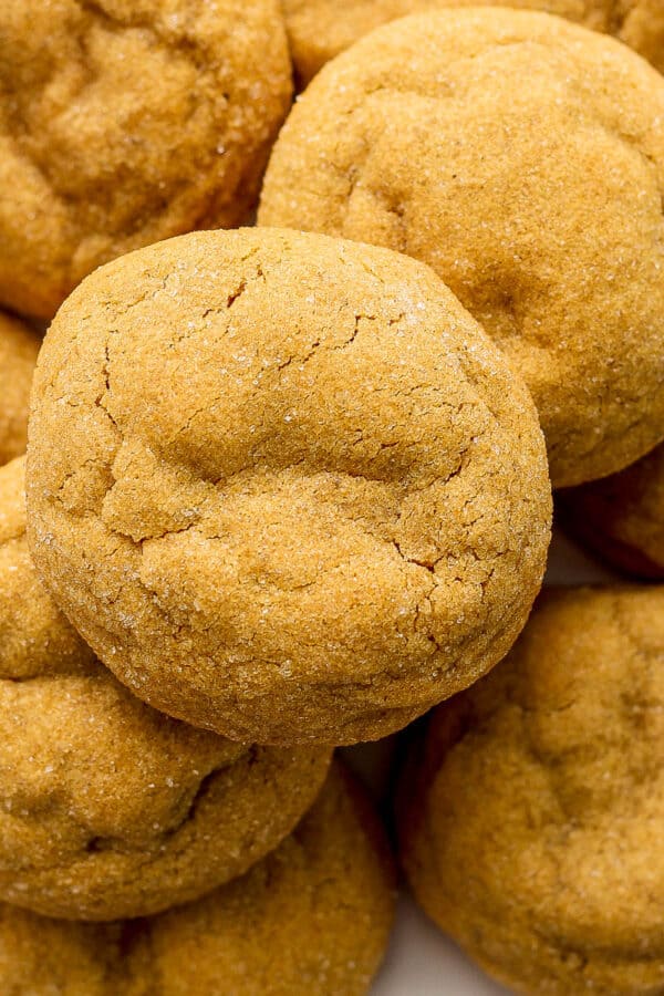 Top down shot of a plate of gluten free ginger molasses cookies.