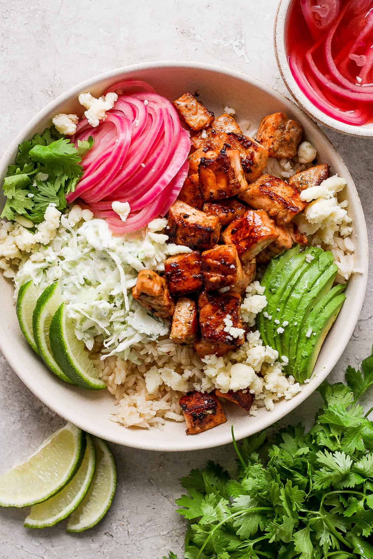 A fully assembled salmon taco bowl.