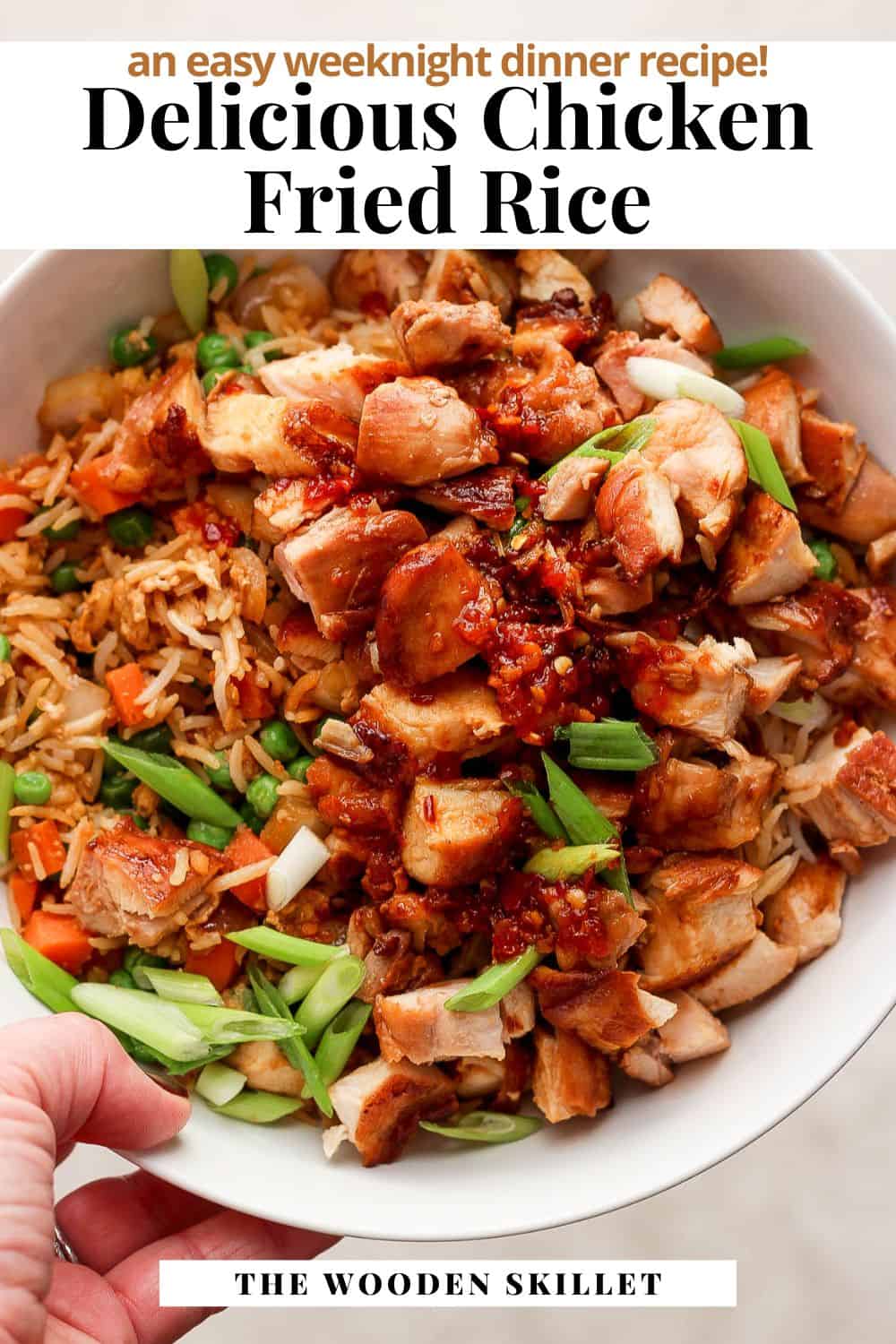 Pinterest image showing chicken fried rice in a bowl with the title "An easy weeknight dinner recipe! Delicious chicken friend rice."