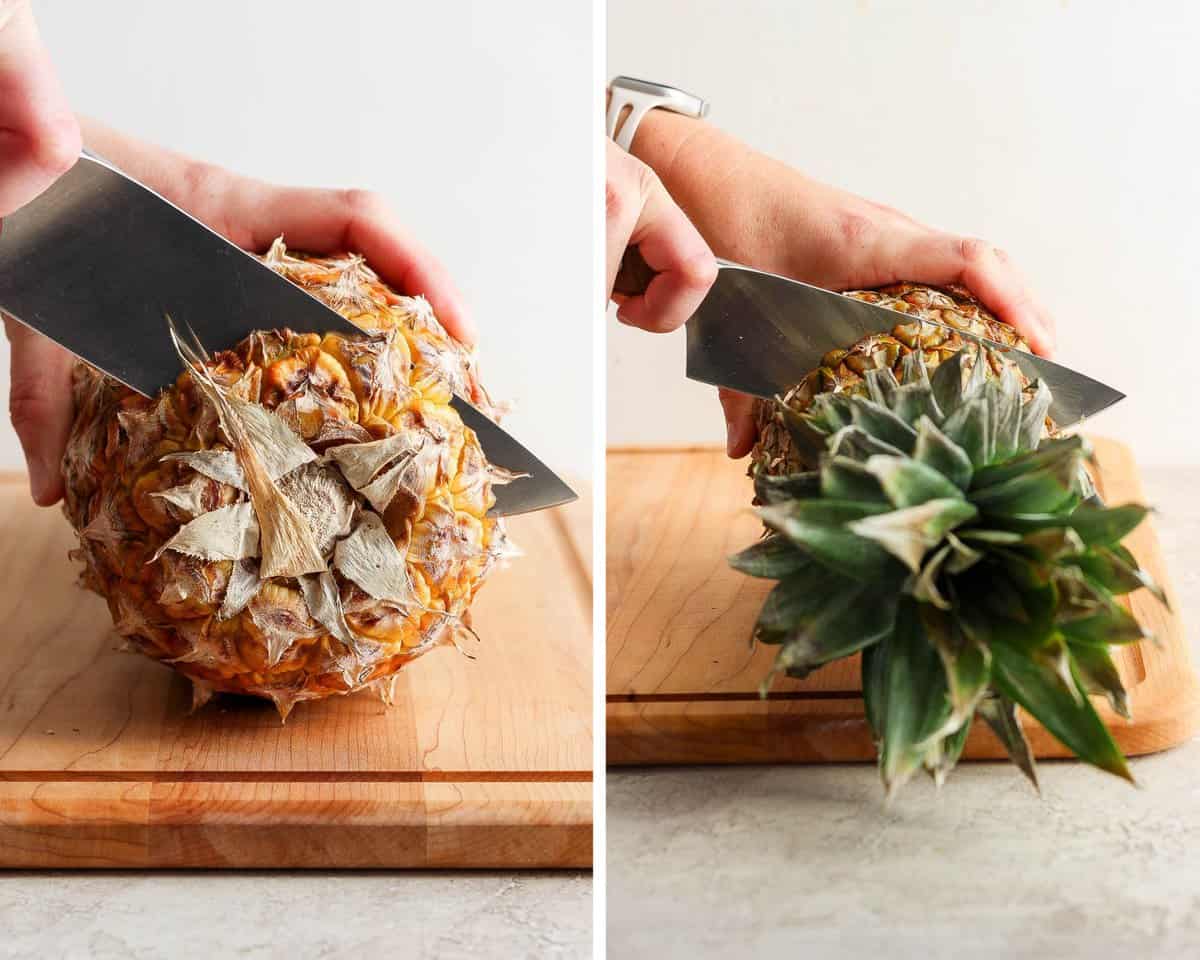 A pineapple on it's side on a cutting board with a knife cutting off the top and the bottom of the pineapple.