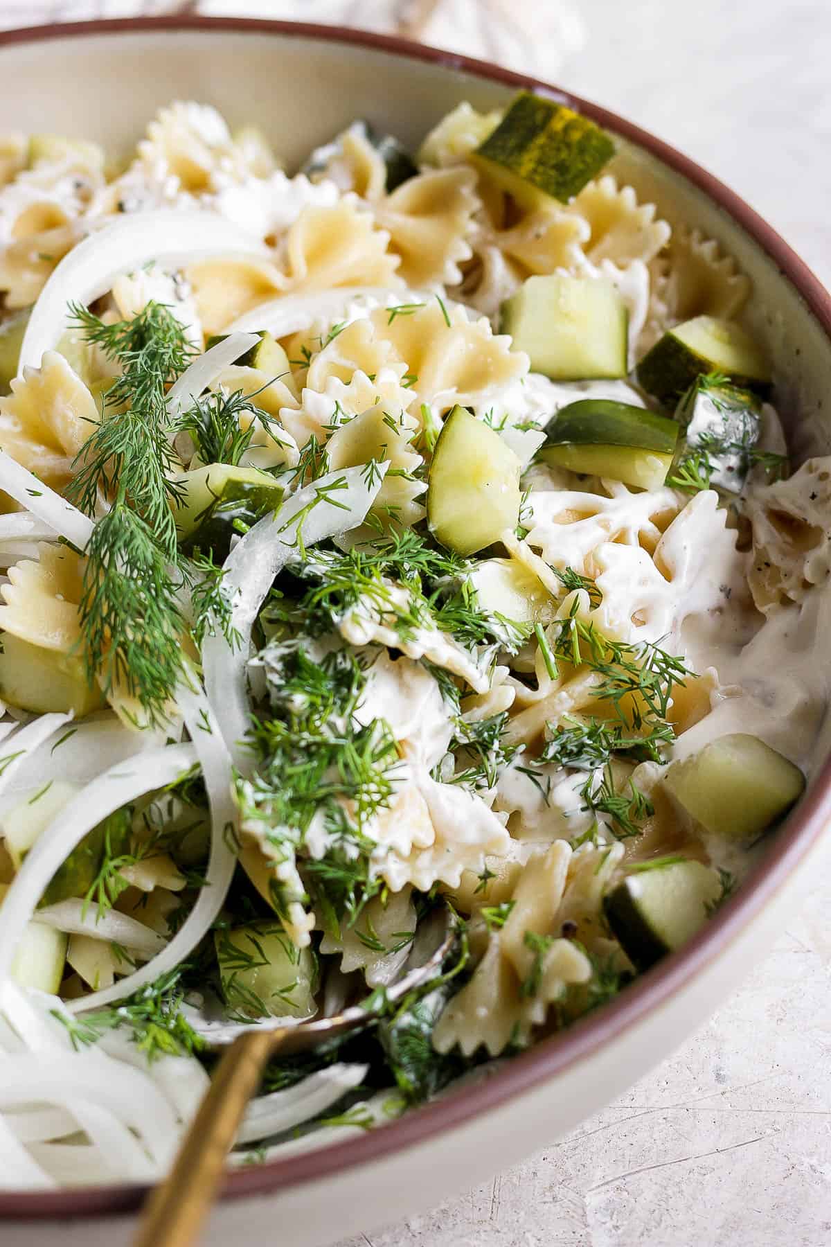 Dill pickle pasta salad in a large bowl.