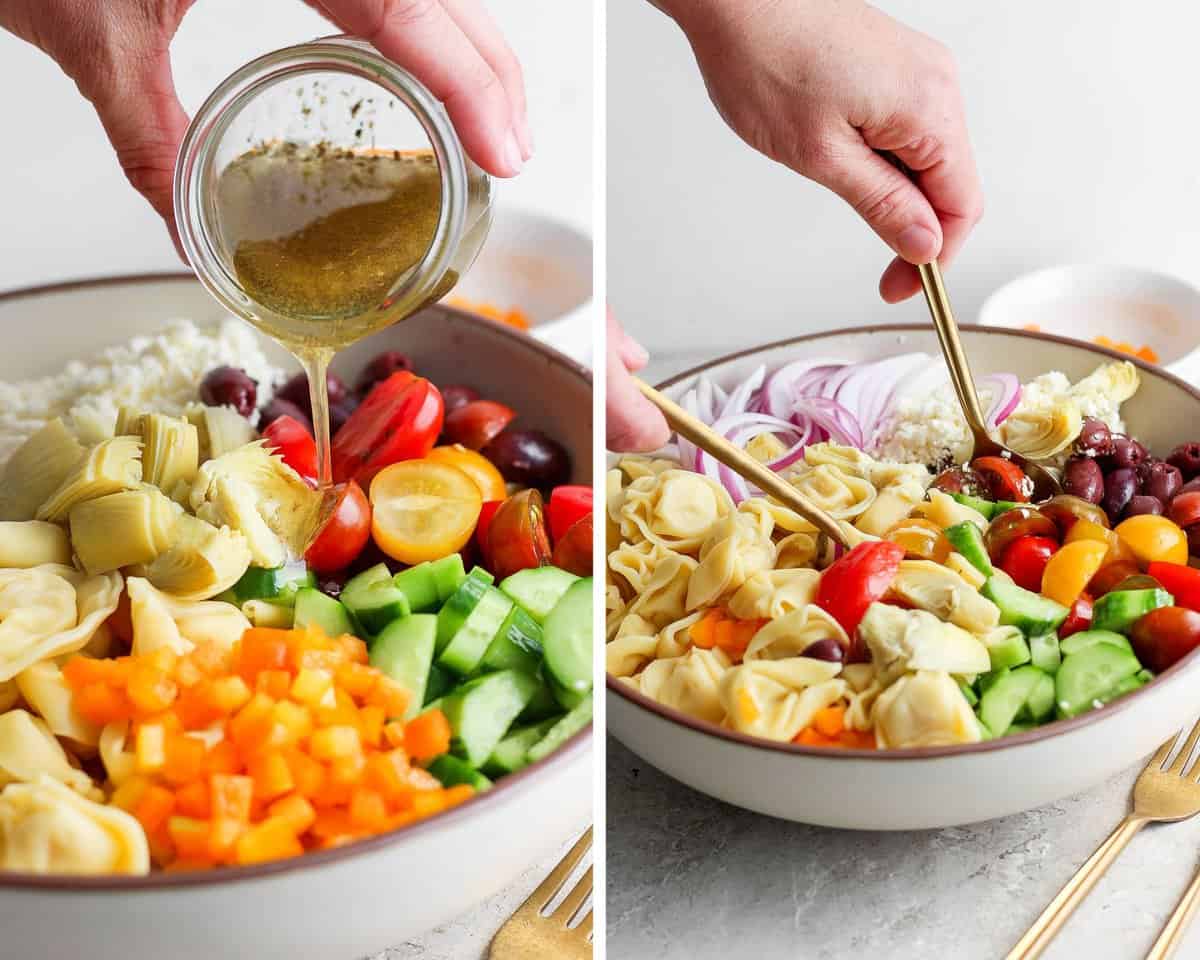 A hand pouring dressing into the bowl of ingredients and then two spoons tossing the salad.